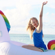 "Woo! I'm on a giant floating unicorn!" (Photo: Amazon)
